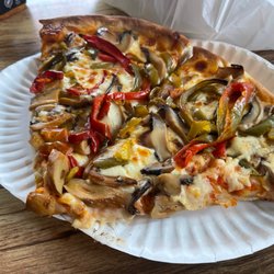 Tony\'s Pizza - My tasty veggie slice of peppers and mushrooms. Tony's Pizzeria in Utica - Burrstone rd by Donovan's Ballpark Stadium. Yummy.