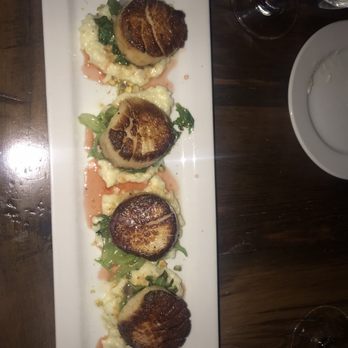 Johnny Manhattan's - Scallops in bed of risotto, arugula, and sweet blood orange glaze - Steakhouses Near Me - Hubertus, Wisconsin Johnny Manhattan's - Scallops in bed of risotto, arugula, and sweet blood orange glaze - Steakhouses Near Me - Hubertus, Wisconsin