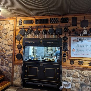 Missouri Hick Barbeque - a kitchen with a stone wall - Barbeque Near Me - Cuba, Missouri