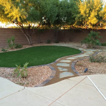 Taylormade Landscapes - End of day 3. New turf installed. Pathway borders, flagstone and crushed granite set. - Landscaping Near Me - Las Vegas, Nevada Taylormade Landscapes - End of day 3. New turf installed. Pathway borders, flagstone and crushed granite set. - Landscaping Near Me - Las Vegas, Nevada