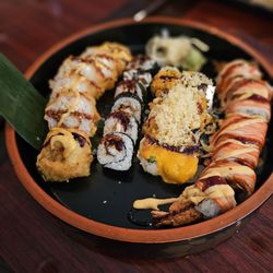 Miyabi Sushi - Left to right... Pink Lady Roll (6 pcs )  Eel Roll (6 pcs) R18. Volcano Roll (8pcs)  R14. Shaggy Dog Roll (8pcs)