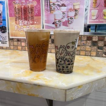 ViVi Bubble Tea - Peach Lemonjade (Large) and Coffee Jelly Bubble Milk Tea - Bubble Tea Near Me - New York, New York ViVi Bubble Tea - Peach Lemonjade (Large) and Coffee Jelly Bubble Milk Tea - Bubble Tea Near Me - New York, New York