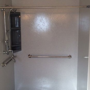 Green's Home Improvement - a shower and toilet - Decks & Railing Near Me