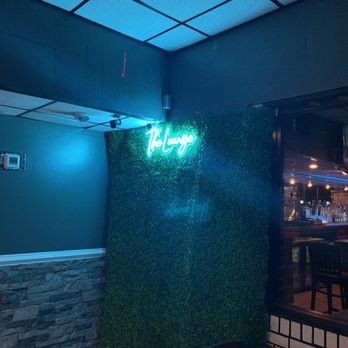 The Lounge - Selfie wall - American Near Me - Burlington, North Carolina