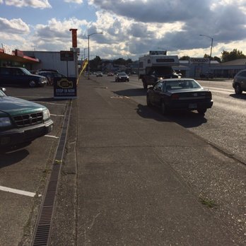 Esty's Auto Center - That's my vehicle that this business decided to park on facing oncoming traffic. Plus it's a feet away from the curb...it's like WTF?! - Auto Repair Near Me - Longview, Washington