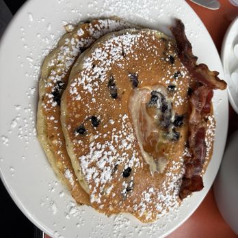 West Side Diner - Blueberry pancakes with a side of bacon. Was able to get just 2 pancakes instead of 3. Lots of fresh blueberries. - Diners Near Me - Providence, Rhode Island