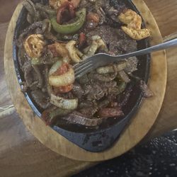 El Mariachi Mexican Restaurant - T-Bone streak with onions, peppers.