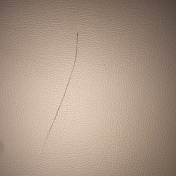 Covert Ford Lincoln - Scratch on the back seat - Car Dealers Near Me - Austin, Texas