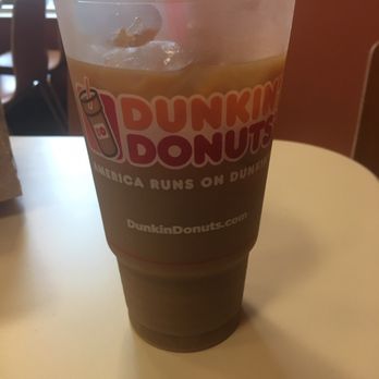Dunkin' - a cup of coffee on a table - Coffee & Tea Near Me - Tinton Falls, New Jersey Dunkin' - a cup of coffee on a table - Coffee & Tea Near Me - Tinton Falls, New Jersey
