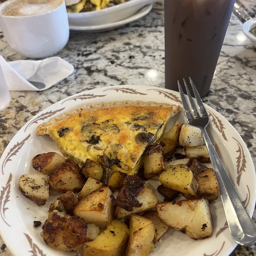 Mushroom and mozzarella quiche with roasted red potatoes. Also, an iced butter pecan latte. Everything was amazing! Mushroom and mozzarella quiche with roasted red potatoes. Also, an iced butter pecan latte. Everything was amazing!