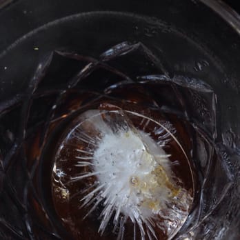 PublicUs - Picture of my empty Old Fashioned coffee cocktail. I thought the pattern of the ice breaking was purdy. - Coffee & Tea Near Me - Las Vegas, Nevada
