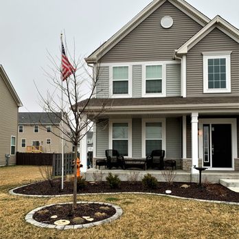 Border Magic - a house with a flag in the front yard - Landscaping Near Me - Frankfort, Illinois Border Magic - a house with a flag in the front yard - Landscaping Near Me - Frankfort, Illinois