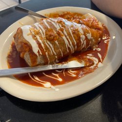 Mi Rinconzito Restaurant - Wet Burrito! Very flavorful! Quick and friendly service