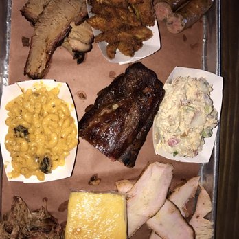 Sugarfire Smoke House - Meat Daddy4 bone ribs, jalapeño cheddar sausage link & 4 oz each of brisket, pulled pork, & turkey. - Barbeque Near Me - O'Fallon, Missouri Sugarfire Smoke House - Meat Daddy4 bone ribs, jalapeño cheddar sausage link & 4 oz each of brisket, pulled pork, & turkey. - Barbeque Near Me - O'Fallon, Missouri