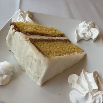 The West End Grill - The brown butter cake with orange zest and graham crackers (it wasn't too sweet and tasted good. But I didn't taste any graham crackers). - American Near Me - Ann Arbor, Michigan The West End Grill - The brown butter cake with orange zest and graham crackers (it wasn't too sweet and tasted good. But I didn't taste any graham crackers). - American Near Me - Ann Arbor, Michigan