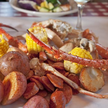 The Crab Pot - Alaskan King Crab, spicy hot sausage, red potatoes, corn cobbettes!  Wear old clothes. - Seafood Near Me - Long Beach, California