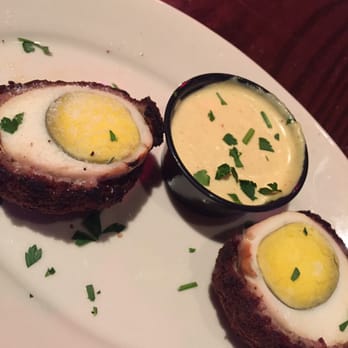 Redcoat Tavern - Scottish egg with mustard sauce. Really good! - Bars Near Me - Royal Oak, Michigan