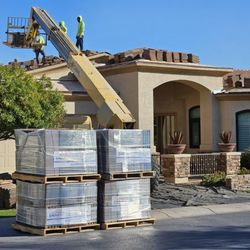 Craven Construction - Loading the tile roof.