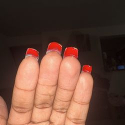 Largo Nails - I asked for red under my nails and a red heart on my nail i didn't get the heart and this is how she did the red