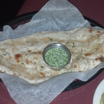 Himalayan Kitchen - Garlic Naan.........Naan covered with minced garlic and cilantro. - Indian Near Me - Honolulu, Hawaii Himalayan Kitchen - Garlic Naan.........Naan covered with minced garlic and cilantro. - Indian Near Me - Honolulu, Hawaii