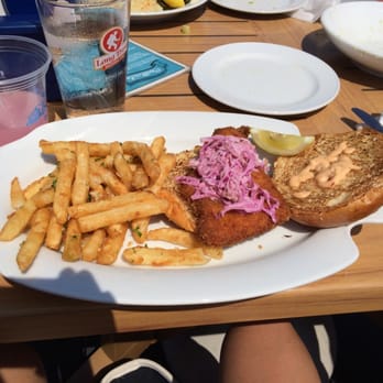 Bungalow Bar - Fried fish sandwich on a fish plate!! - American Near Me - Seaside, New York Bungalow Bar - Fried fish sandwich on a fish plate!! - American Near Me - Seaside, New York