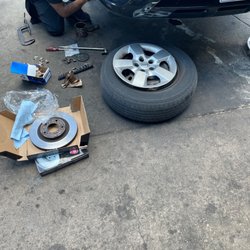 Mk Services, Ltd - Employee changing brake pads and rotor!