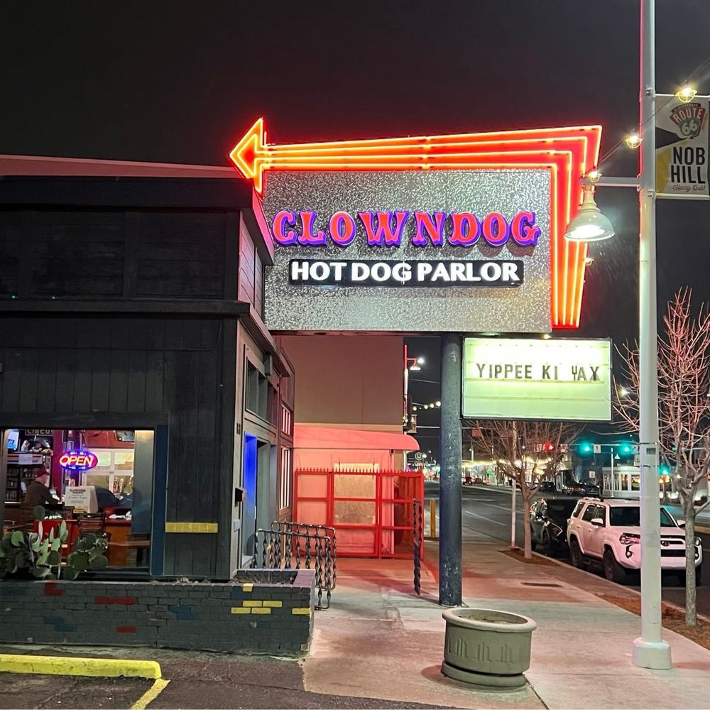 Clowndog Hot Dog Parlor - Parking Lot view - Hot Dogs Near Me - Albuquerque, New Mexico Clowndog Hot Dog Parlor - Parking Lot view - Hot Dogs Near Me - Albuquerque, New Mexico