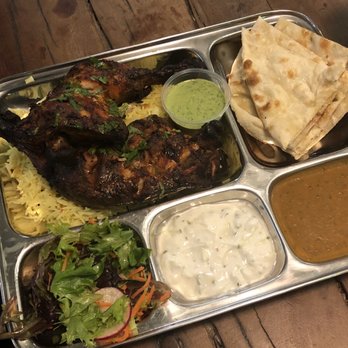 ADYA - Tandoori Chicken Thali. HUGE portion. Very tasty. Lemon rice (has lentils), naan, salad (w dressing), raita, dahl. - Indian Near Me - Anaheim, California