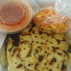 Pupuseria Bionica - Cheese and jalapeno pupusas with curtido and hot sauce