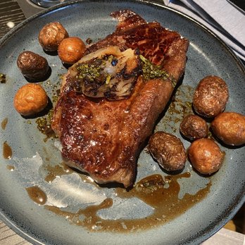 Curfew - New York Strip with marble potatoes - New American Near Me - Memphis, Tennessee