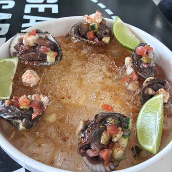 Da Seafood Cartel - Blood cockles topped with shrimp ceviche - Seafood Near Me - Aiea, Hawaii Da Seafood Cartel - Blood cockles topped with shrimp ceviche - Seafood Near Me - Aiea, Hawaii