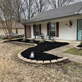 Rowe lawncare - the front yard of a home with black mulch - Lawn Services Near Me Rowe lawncare - the front yard of a home with black mulch - Lawn Services Near Me