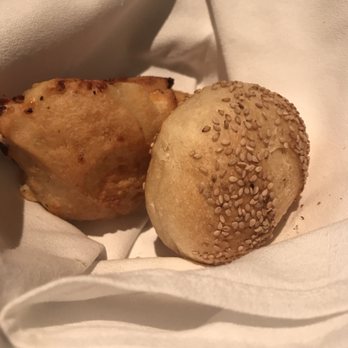 Dukes Chophouse - Warm olive and sesame bread rolls - Lounges Near Me - Schenectady, New York