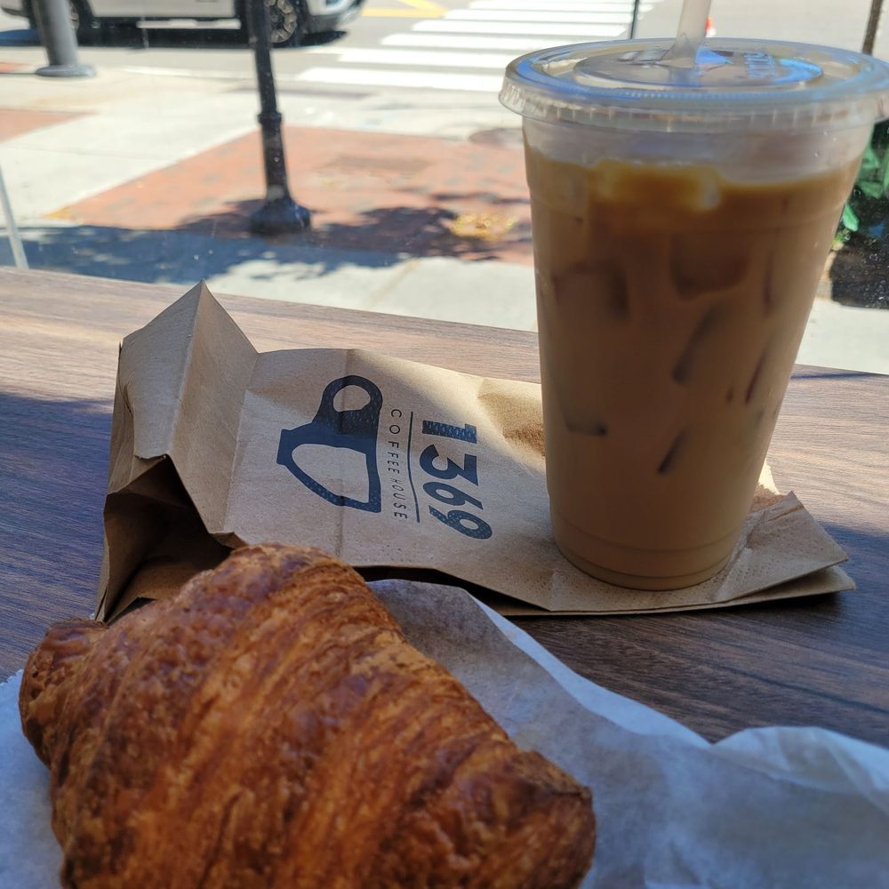1369 Coffee House - Malted cold brew and a croissant - Coffee & Tea Near Me - Cambridge, Massachusetts