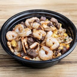 Fried rice with shrimp chicken and steak #16 House Special Fried Rice Fried rice with shrimp chicken and steak #16 House Special Fried Rice