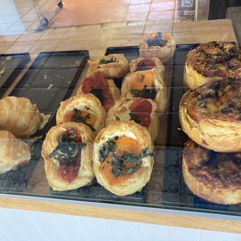 Wilder Bakeshop - Ham and cheese on croissant, heirloom tomatoes mozzarella and basil. Green chile and egg quiche. - Bakeries Near Me - Chama, New Mexico Wilder Bakeshop - Ham and cheese on croissant, heirloom tomatoes mozzarella and basil. Green chile and egg quiche. - Bakeries Near Me - Chama, New Mexico