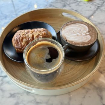 Blue Mountain Coffee Roasters - Almond Croissant, coffee, and hot chocolate - Coffee & Tea Near Me - Suwanee, Georgia Blue Mountain Coffee Roasters - Almond Croissant, coffee, and hot chocolate - Coffee & Tea Near Me - Suwanee, Georgia