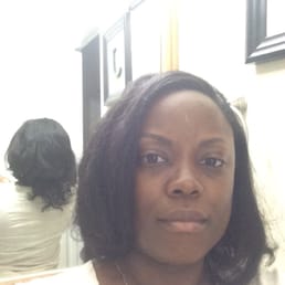 1.5 years of natural hair growth from a big chop. This is after my first visit at the salon