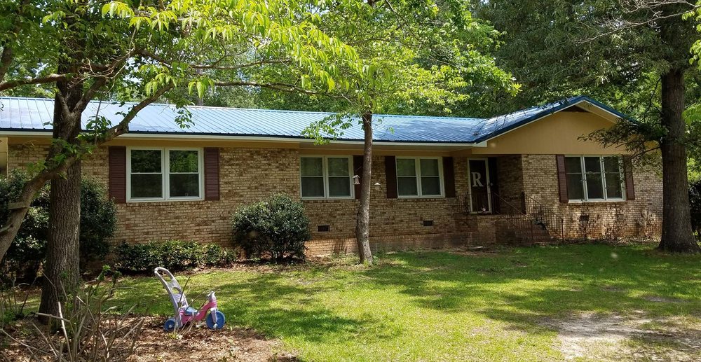 Slide of Whitt's Quality Roofing