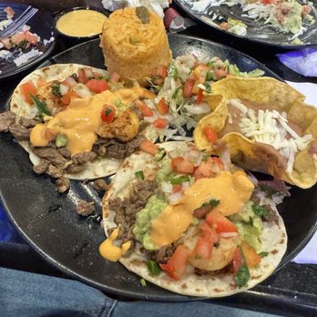 Sammy's Mexican Grill & Bar - surf & turf tacos!!  margarita in the back there. - Mexican Near Me - Elgin, Illinois