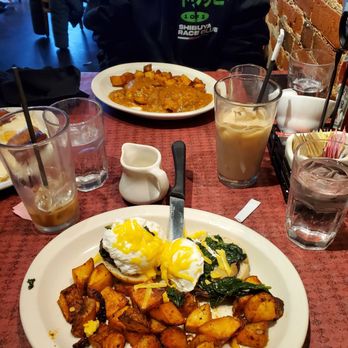 Betty's - Portabello Benedict, in the background, biscuits and gravy - New American Near Me - Buffalo, New York Betty's - Portabello Benedict, in the background, biscuits and gravy - New American Near Me - Buffalo, New York