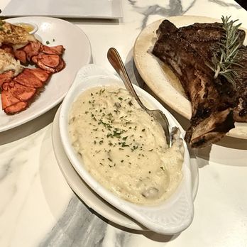 Little Joe’s Steakhouse - Tomahawk Steak, Pair of Lobster Tails and Mashed Potatoes - Steakhouses Near Me - Honolulu, Hawaii