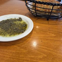 Tony's Pasta House & Gourmet Pizzeria - Italian bread with a Italian dipping sauce