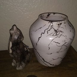 The new wolf figurine with an old horse hair vase The new wolf figurine with an old horse hair vase