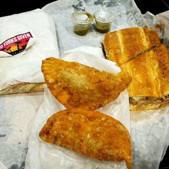 No Forks Given - Chicken Empanadas and Pan Con Lechon Sandwich. Spicy Verde Sauce. - Food Trucks Near Me