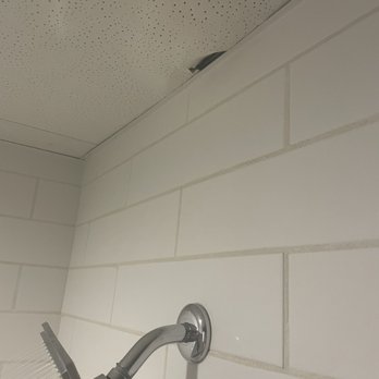 Grand Traverse Resort & Spa - Warped, bulging, plaster ceiling in the shower, with a hole - Resorts Near Me - Acme, Michigan Grand Traverse Resort & Spa - Warped, bulging, plaster ceiling in the shower, with a hole - Resorts Near Me - Acme, Michigan