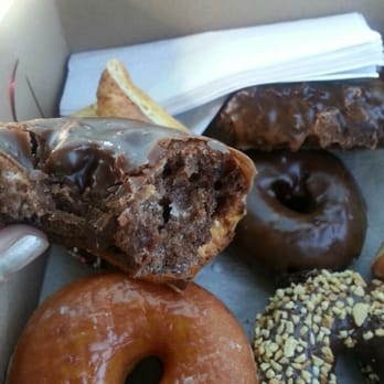 The Donut Factory - Inside of a chocolate chocolate glazed cake donut. Mmmm. It was soft and yummy. - Donuts Near Me - Vista, California