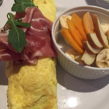 Red Tavern - Pancetta omelet with ricotta and arugula. Side fruit cup - New American Near Me - Chico, California Red Tavern - Pancetta omelet with ricotta and arugula. Side fruit cup - New American Near Me - Chico, California