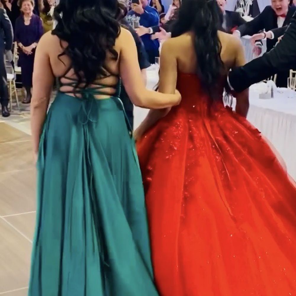 One Hour Alterations - Both gowns cut in length, and the "horsetail" which keeps the bottom flowy was kept on my green dress. - Sewing & Alterations Near Me - San Jose, California One Hour Alterations - Both gowns cut in length, and the "horsetail" which keeps the bottom flowy was kept on my green dress. - Sewing & Alterations Near Me - San Jose, California