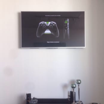 Chicago TV Installer - Our living room tv with wire management - Home Theatre Installation Near Me